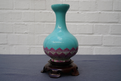 A Chinese famille rose turquoise ground lotus flower-shaped vase, 19/20th C.